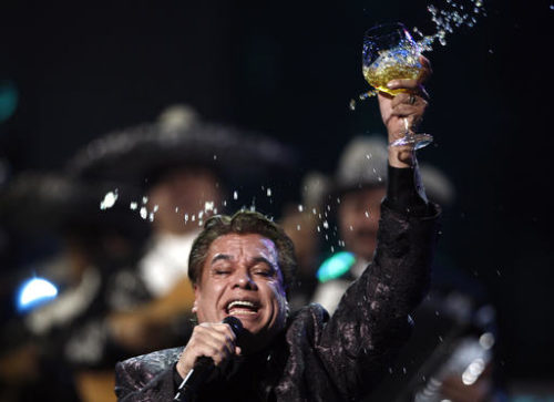 FILE - In this Nov. 5, 2009, file photo, Juan Gabriel performs at the 10th Annual Latin Grammy Awards in Las Vegas. Representatives of Juan Gabriel have reported Sunday, Aug. 28, 2016, that he has died.