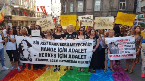 Turkish activists gather to protest the rape and brutal murder of transgender woman Hande Kedar. The banner reads: "We want to die of natural causes."