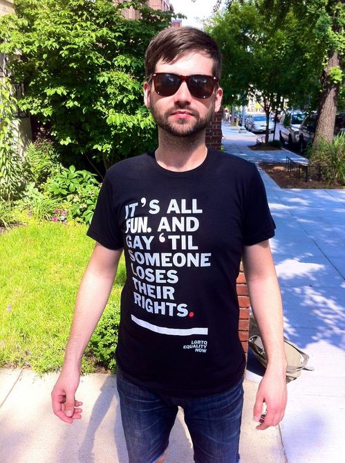 James Graden Holmes modeling activist wear.