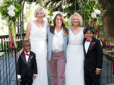 Betty Iverson, Kate Kendell, Jackie Biskupski and the couple's adopted sons Archie and Jack.