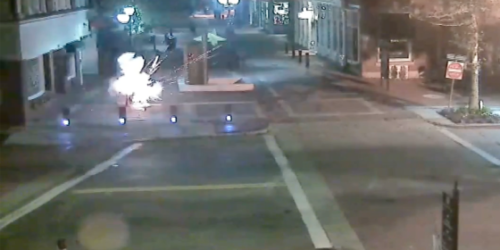 A bomb explodes inside a newspaper box for the LGBT publication Rainbow Times