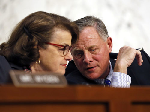 Senate Intelligence Chairman Richard Burr, right, is fighting for his political life.