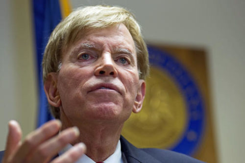 FILE - In this July 22, 2016 file photo, former Ku Klux Klan leader David Duke talks to the media at the Louisiana Secretary of State's office in Baton Rouge, La. A war of words over Donald Trump’s “deplorables” is intensifying as Republicans and Democrats fight to score political points over Hillary Clinton’s charge that millions of the New York billionaire’s supporters are racist, sexist and homophobic.