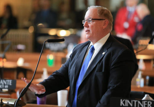 FILE - In this March 29, 2016 file photo, Nebraska state Sen. Bill Kintner of Papillion speaks during debate in Lincoln, Neb. The conservative Nebraska state senator is holding firm in his refusal to resign from office after admitting that he had cybersex on a state laptop with a woman he met online, Friday, Sept. 2, 2016. Members of the Legislature's Executive Board have threatened to recommend that he be impeached or expelled from the Legislature.