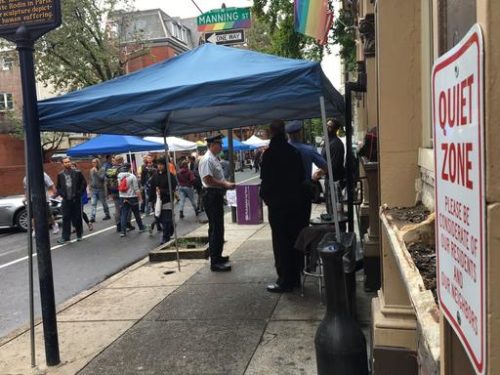 Staff and security stand outside iCandy nightclub in Philadelphia during the city's annual OutFest, Sunday, Oct. 9, 2016. The club's owner was recorded using a racial slur, helping spur a conversation about racism in the city's lesbian, gay, bisexual and transgender community.