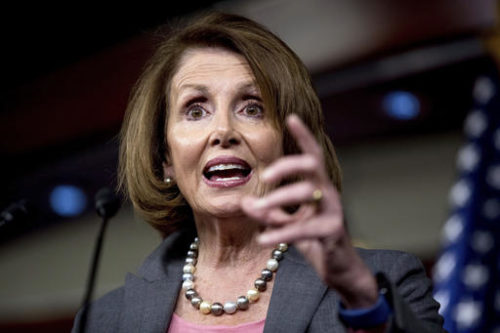 In this Nov. 17, 2016, file photo, House Minority Leader Nancy Pelosi of Calif. speaks on Capitol Hill in Washington. Pelosi faces a challenge to her job as frustrated House Democrats meet to select a new slate of leaders. Pelosi is likely to be re-elected easily Nov. 30 despite disenchantment among the Democratic caucus she has led since 2002. Nancy Pelosi