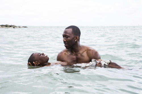 This image released by A24 shows Alex Hibbert, foreground, and Mahershala Ali in a scene from the film, "Moonlight." The GLAAD Media Awards found "Moonlight" and "Star Trek Beyond" the only major films worthy of nominations this year. In announcing the nods Tuesday, Jan. 31, 2017, GLAAD said that’s the fewest nods for gay-inclusive, widely released movies since 2003.