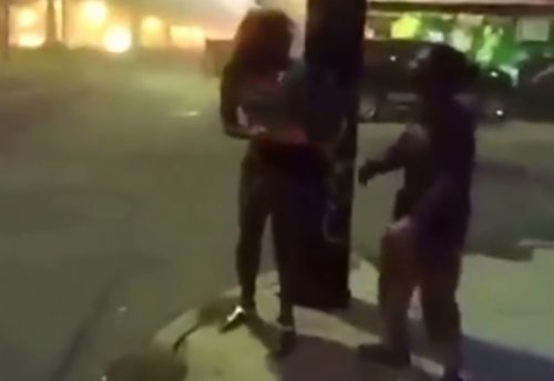 An unknown man accosting a transgender woman on the streets of New Orleans