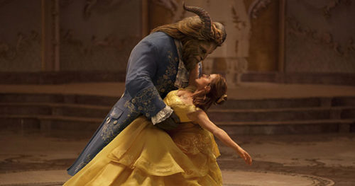 This image released by Disney shows Dan Stevens as The Beast, left, and Emma Watson as Belle in a live-action adaptation of the animated classic "Beauty and the Beast."