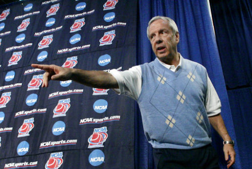 FILE - In this March 16, 2007, file photo, North Carolina coach Roy Williams arrives for interviews with reporters in Winston-Salem, N.C. North Carolina _ which has hosted more NCAA Tournament games than any other state _ was stripped of opening-round games in Greensboro due to passage of a law limiting the protections for LGBT people. Hall of Fame coaches Mike Krzyzewski with Duke and Roy Williams have both spoken publicly against the law in recent months.