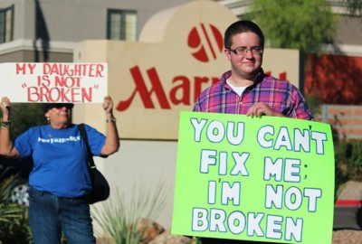 Protesters demonstrate outside a gathering for the National Association For Research and Therapy of Homosexuality (NARTH) in Phoenix, Ariz., in 2013.
