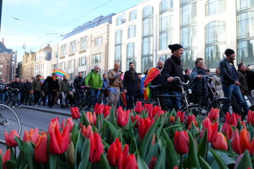 Protesters march through the Dutch capital Amsterdam to show solidarity for two gay men who were badly beaten over the weekend in the eastern city of Arnhem, Wednesday, April 5, 2017. The peaceful match was part of a national outpouring of anger at the incident in which the married men in Arnhem were beaten by a group of youths, in a confrontation that the victims told police started because they were holding hands.