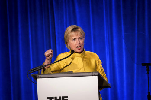 Former Secretary of State Hillary Clinton tries to inspire the LGBTQ community to "resist, insist, persist, and enlist" in the face of uncertainty after accepting the Trailblazer Award during the LGBT Community Center Dinner Thursday, April 20, 2017, in New York.