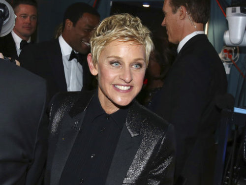 FILE - In this March 2, 2014 file photo, Ellen DeGeneres appears backstage during the Oscars in Los Angeles. DeGeneres made history 20 years ago as the first prime-time lead on network TV to come out, capturing the hearts of supporters gay and straight amid a swirl of hate mail, death threats and, ultimately, dark times on and off the screen.