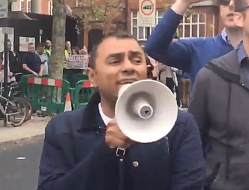 One protestor said in a speech, "When you look across the world, so many people are still being tortured and imprisoned."