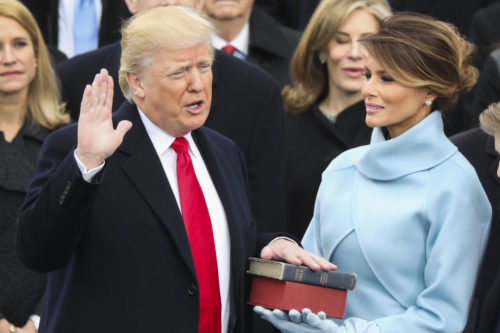Donald Trump being sworn in. Donald Trump