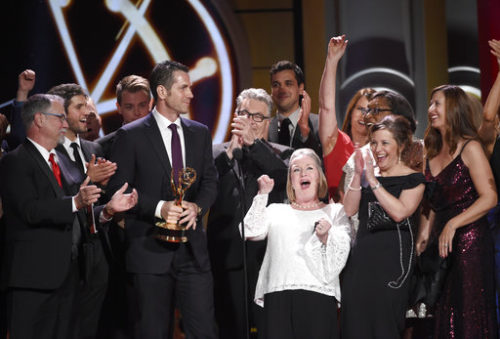 Frank Valentini, third from left, and the cast and crew of "General Hospital" react as they accept the award for outstanding drama series at the 44th annual Daytime Emmy Awards at the Pasadena Civic Center on Sunday, April 30, 2017, in Pasadena, Calif.