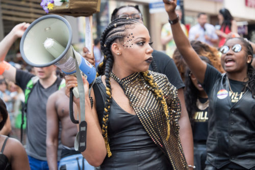 TORONTO,CANADA-JULY 3,2016: Black Lives Matter halts the Toronto Pride Parade staging a sit-in and making demands to Pride Executives. BLM was the honored guest to the celebration.