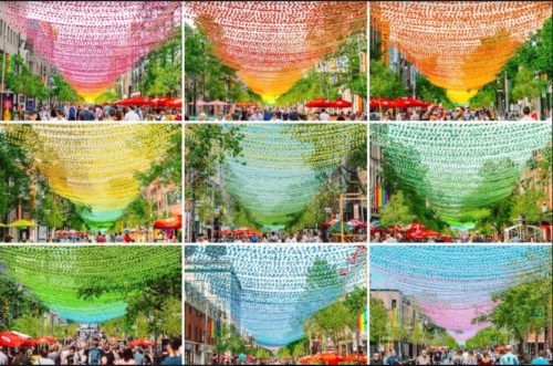A rainbow light installation seen suspended above the pedestrian axis of Sainte-Catherine Street East in Montreal. Montreal LGBTQ pride