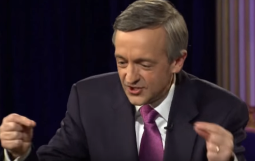 Robert Jeffress, explaining how sex works by jabbing his fingers together.