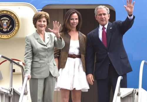 Daughter Barbara with parents George and Laura Bush, exiting Air Force One. August 4, 2008