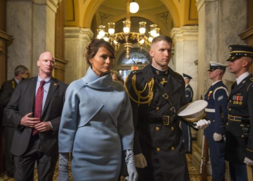 Melania Trump, escorted by a U.S. Marine, arrives at the 58th Presidential Inauguration in Washington, D.C., Jan. 20, 2017. Melania Trump