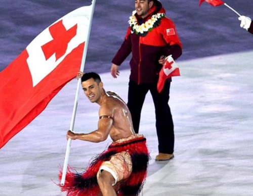 Pita Taufatofua oiled shirtless tonga flag bearer