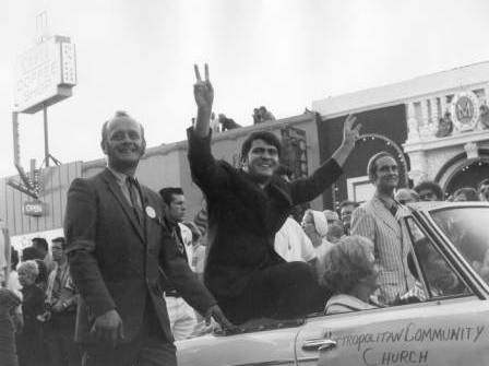 Sharing the peace sign is the Rev. Troy Perry, one of founders of Los Angeles’ first Pride parade, in 1970.