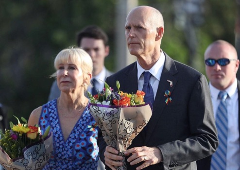 Rick Scott pays tribute the 49 Pulse shooting victims wearing a rainbow ribbon. Rick Scott pays tribute the 49 Pulse shooting victims wearing a rainbow ribbon.