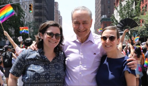 NY Senator Chuck Schumer embraces his daughter and her fiancee at the NYC Pride Parade. NY Senator Chuck Schumer embraces his daughter and her fiancee at the NYC Pride Parade.