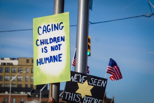 JUNE 14, 2018: A sign reads, "Caging children is not humane" at the protest to Keep Families Together in Detroit. immigration protest