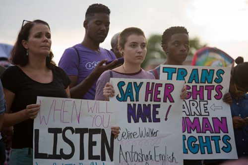 Signs at the rally bore names of some of the transgender women who were killed. Activists and members of the LGBT community have been concerned about the way the Jacksonville Sheriff’s Office investigated the murders.