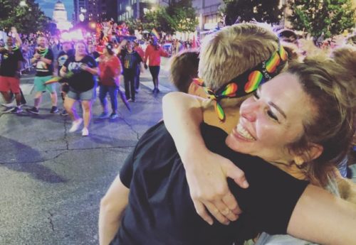 Jen Hatmaker gives a "mom hug" at Austin Pride Jen Hatmaker gives a "mom hug" at Austin Pride