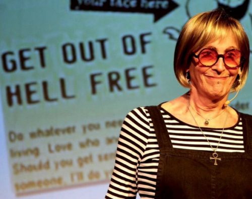 Kate Bornstein on stage performing during "On Men, Women, and the Rest of Us" at La Mama theater. Kate Bornstein on stage performing during "On Men, Women, and the Rest of Us" at La Mama theater.