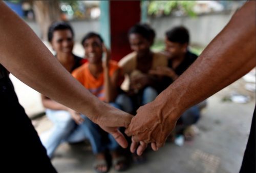 india-hands-holding