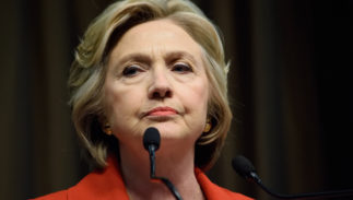 Hillary-Clinton-frown-orange-323x183.jpg