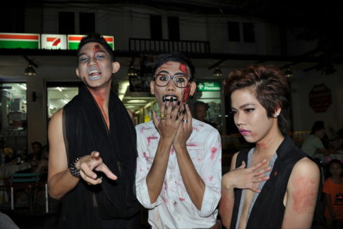 Three Halloween revelers Three Halloween revelers