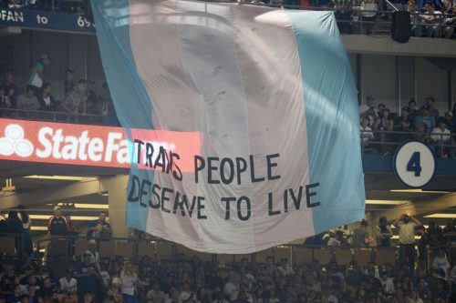 Activists from the TransLatin@ Coalition unfurled this huge banner during the final game of the World Series last night. Activists from the TransLatin@ Coalition unfurled this huge banner during the final game of the World Series last night.