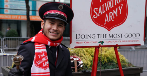 DECEMBER 19, 2017: Salvation Army soldier performs for collections in midtown Manhattan. DECEMBER 19, 2017: Salvation Army soldier performs for collections in midtown Manhattan.