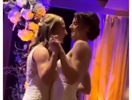The happy couple shared some moments from their wedding on social media. Two women in wedding dresses dancing.