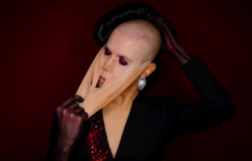 Alexis Stone pulling off a latex mask