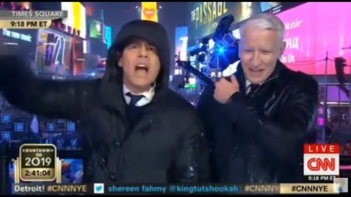 Andy Cohen and Anderson Cooper hosting CNN's annual New Years Eve broadcast from Times Square. Andy Cohen and Anderson Cooper hosting CNN's annual New Years Eve broadcast from Times Square.