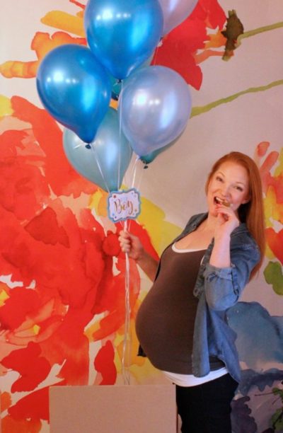 Heather Green holding blue balloons