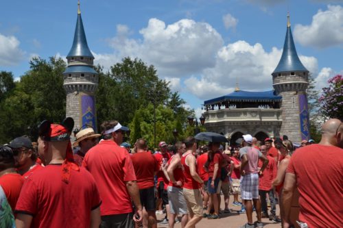 Visitors to the Magic Kingdom's Gay Day wear red as part of the festivities