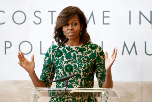 First Lady of the United States Michelle Obama at ribbon cutting ceremony for Anna Wintour Costume Center Grand Opening at Metropolitan Museum of Art on May 5, 2014 in New York City. First Lady of the United States Michelle Obama at ribbon cutting ceremony for Anna Wintour Costume Center Grand Opening at Metropolitan Museum of Art on May 5, 2014 in New York City.