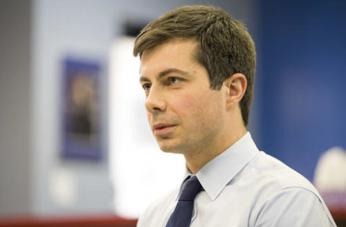 In this Wednesday, Jan. 4, 2017 photo, South Bend, Ind., Mayor Pete Buttigieg talks to a South Bend Tribune reporter regarding interest in the Democratic National Committee chairman position, inside the St. Joseph County Democratic Party headquarters in South Bend, Ind. Buttigieg announced his chairman candidacy Thursday, Jan. 5. In this Wednesday, Jan. 4, 2017 photo, South Bend, Ind., Mayor Pete Buttigieg talks to a South Bend Tribune reporter regarding interest in the Democratic National Committee chairman position, inside the St. Joseph County Democratic Party headquarters in South Bend, Ind. Buttigieg announced his chairman candidacy Thursday, Jan. 5.