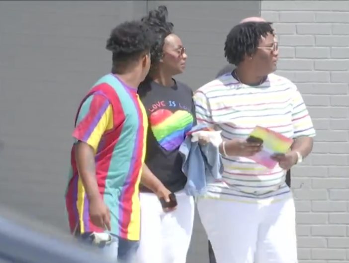 People at the funeral of Nigel Shelby.