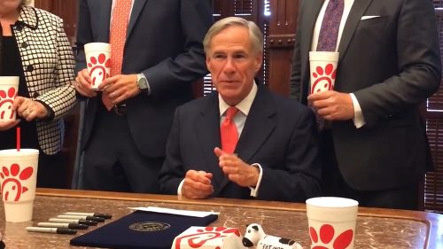 Greg Abbott surrounded by Chick-fil-A