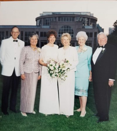 Lawrie Demorest and Lee Kyser are surrounded by family at their "wedding ceremony" at the Atlanta Botanical Garden.