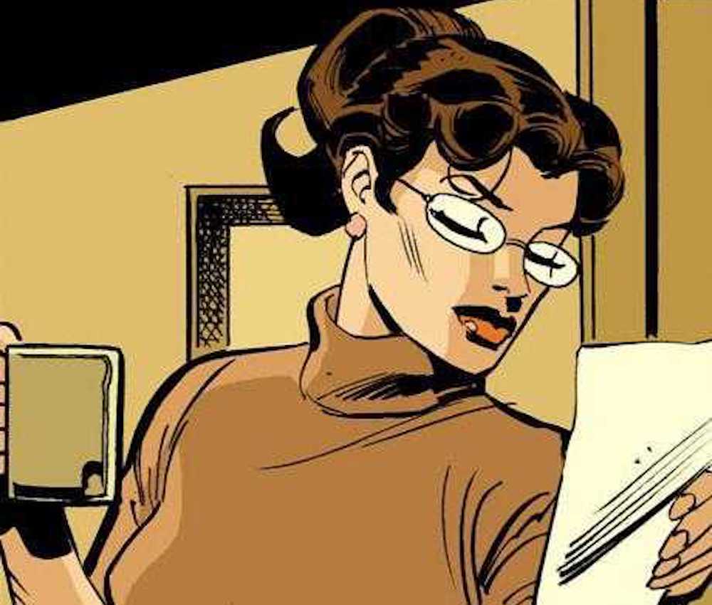 Vesper Fairchild is a brunette female journalists with glasses